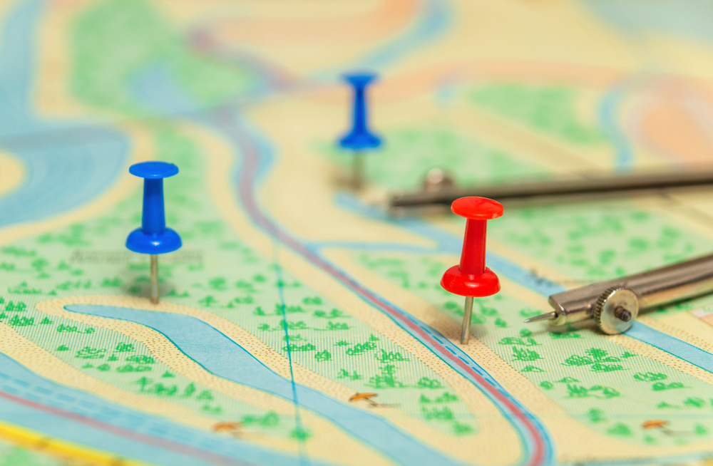 The red button on the topographic map indicating the necessary destination